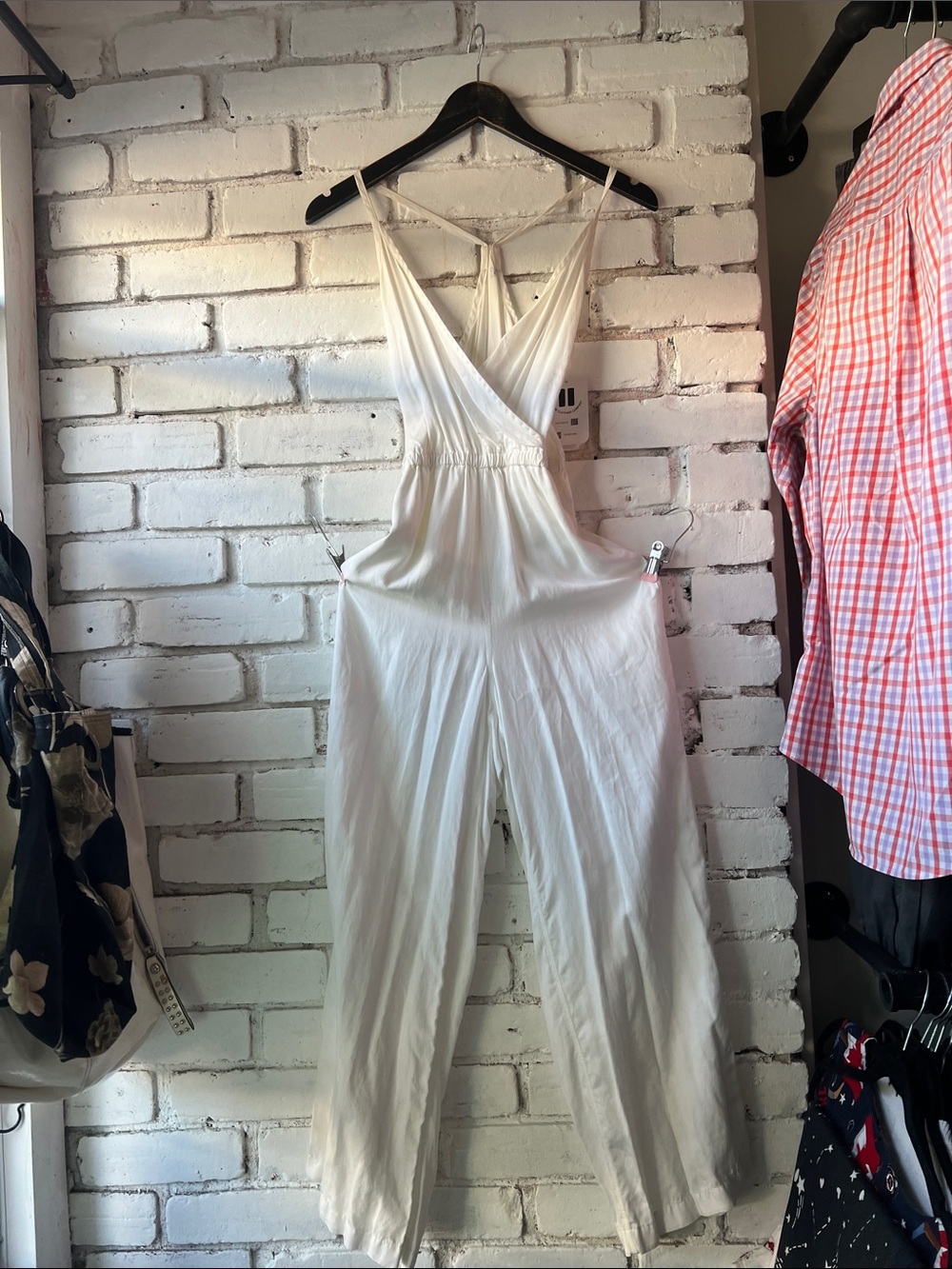 White Sleeveless V-Neck Jumpsuit lululemon flowy leg romper wide leg